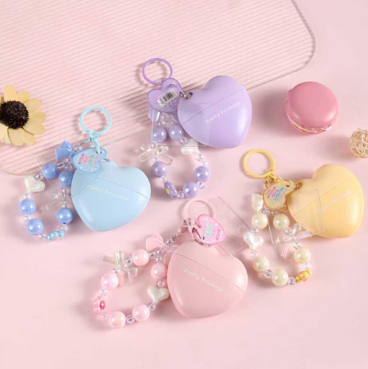 Pretty Privilege Heart Pop Hand Cream Phone Charm Wristlet Set